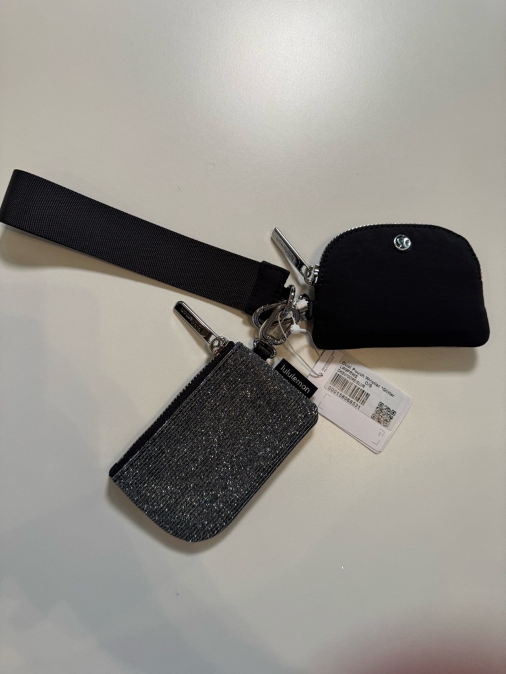 Lululemon NWT DUAL POUCH wristlet Glitter Color: DARKSLV/GRAPHITEGRAY/SILVER